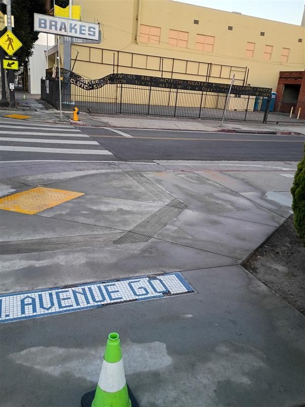 Sidewalk near Figueroa, Avenue 61 to 60 after pressure washing