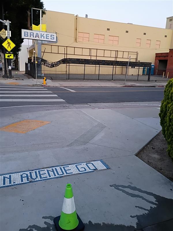 Sidewalk near Figueroa, Avenue 61 to 60 before pressure washing