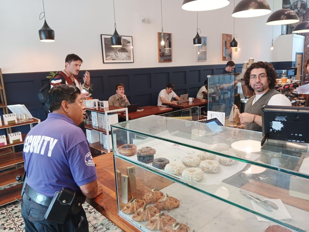 BID security officer visiting Civil Coffee