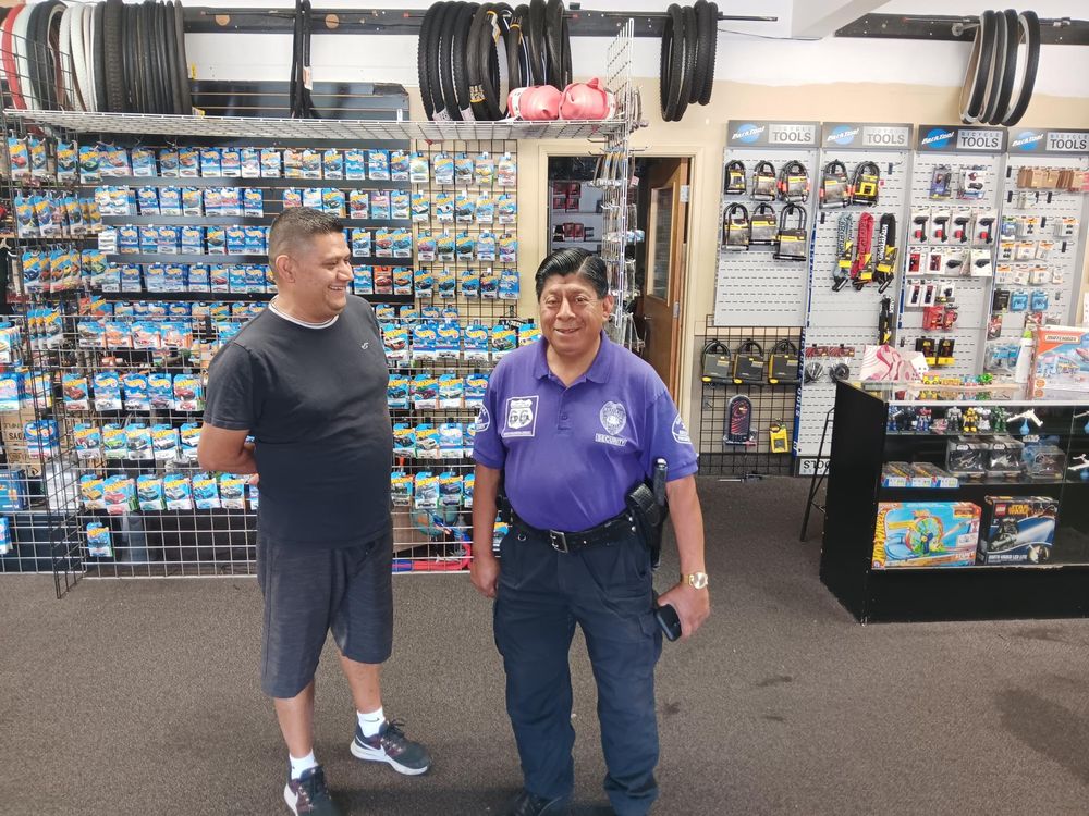 BID security officer Martin Hernandez checking in at Raff’s Bike Shop